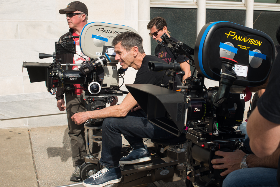 Cinematographer Bill Pope using the Panaflex camera behind the scenes of Baby Driver