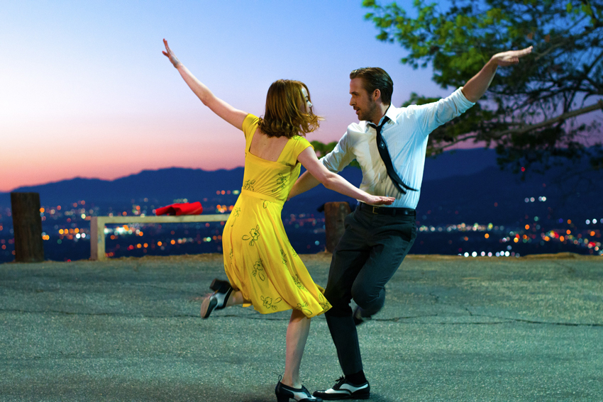 Ryan Gosling and Emma Stone dancing during the film La La Land